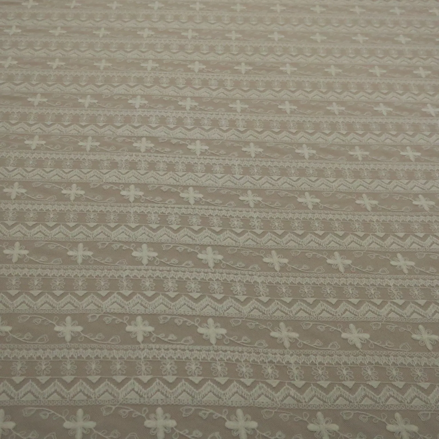 White Tulle with Ivory Floral Design Embroidered Fabric