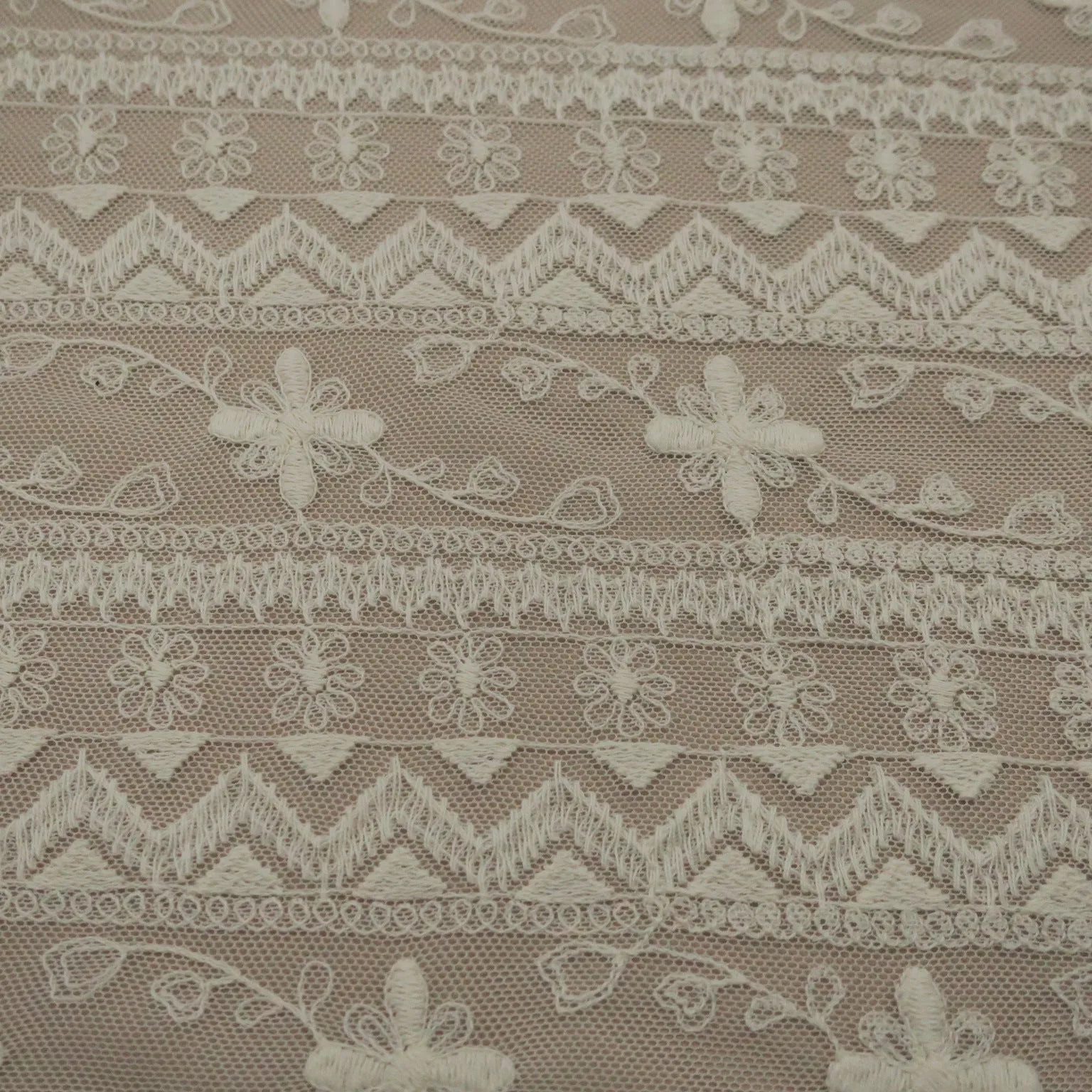 White Tulle with Ivory Floral Design Embroidered Fabric
