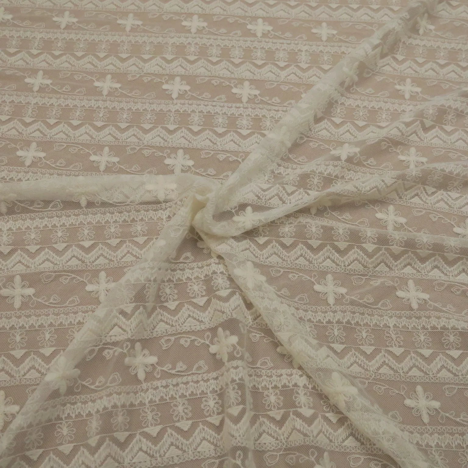 White Tulle with Ivory Floral Design Embroidered Fabric